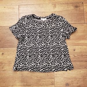 Anthropologie eri + ali black and white leopard print short sleeve top Size M
